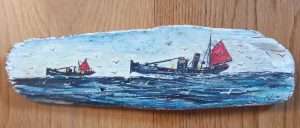 NIGEL LEGGE (Cornish Fisherman - Artist) Stream Drifters Home Ward Bound 2000 - painting on driftwood with description and signature on the reverse. The maximum height of the painting is 7.3cm (2.9 inches) and the maximum width is 24.4cm (9.6 inches). £75